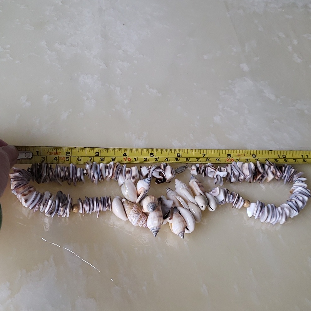 Shells and natural shell tidbits necklace with a magnetic clasp